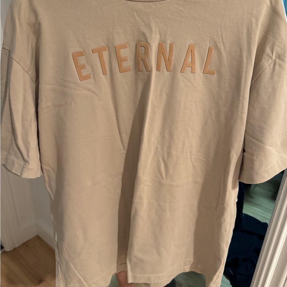 Only tried on ! Fear of god.  Eternal t shirt. Size m
